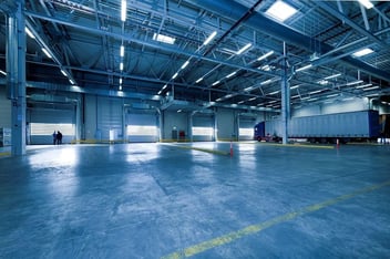 Modern warehouse with AI-powered robots and inventory systems optimizing operations